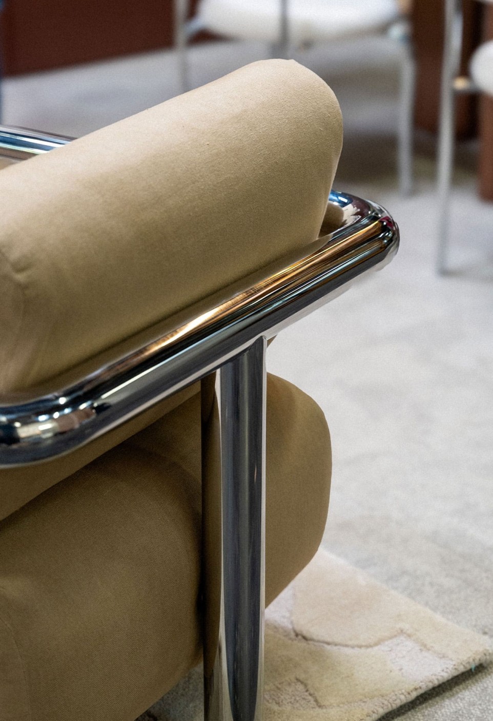 70 CLAUDE ARMCHAIR  POLISHED STAINLESS STEEL